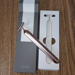 T-bar facial massager